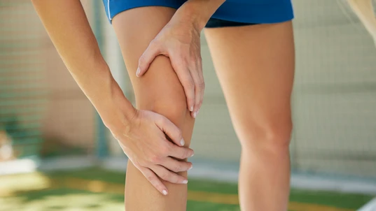Female athlete with knee injury